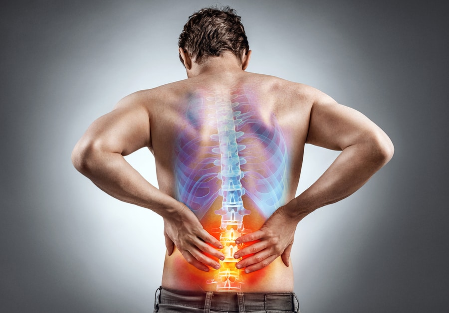 man suffering from back pain